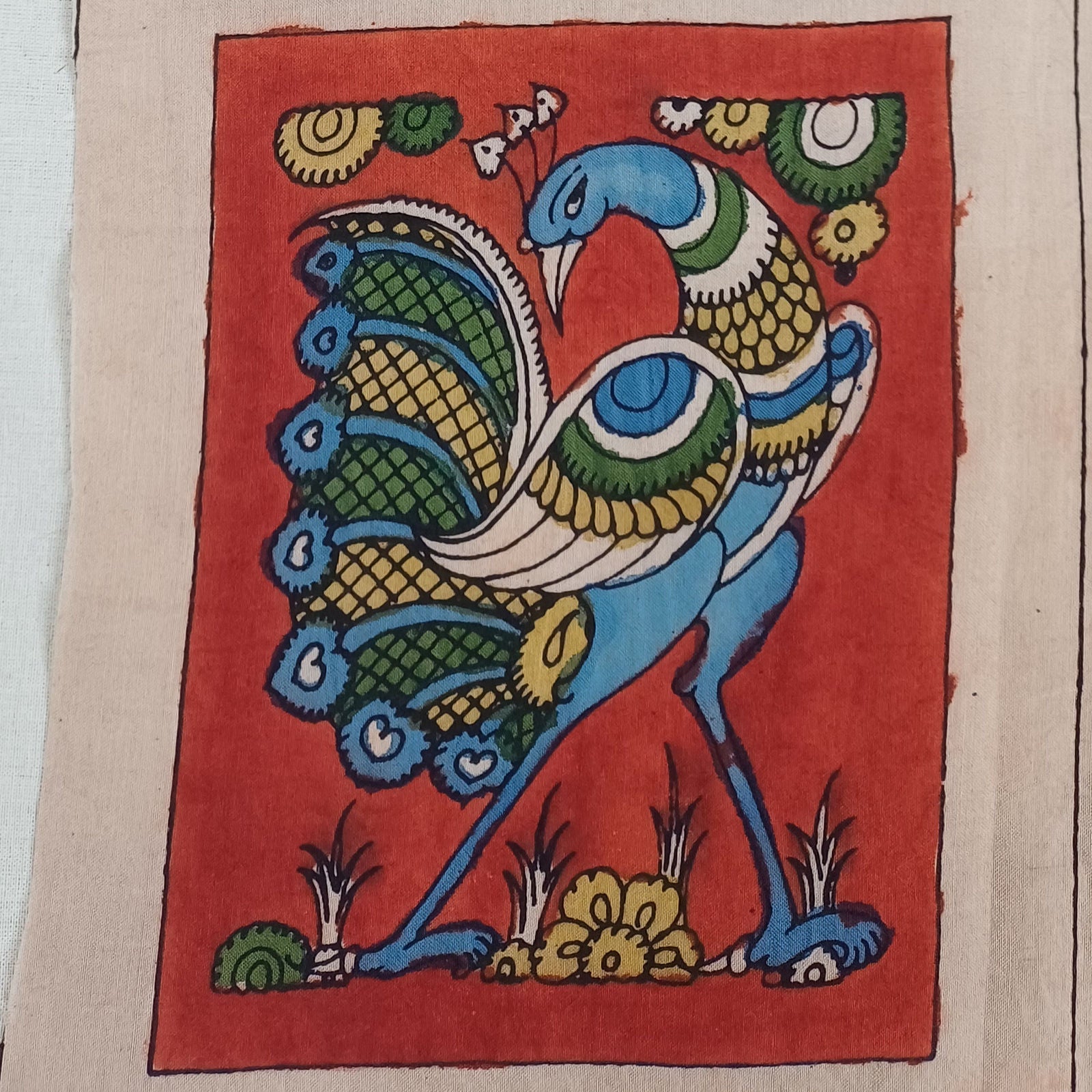 Red Kalamkari Bangalore Silk fabric piece with figurative design and border detail