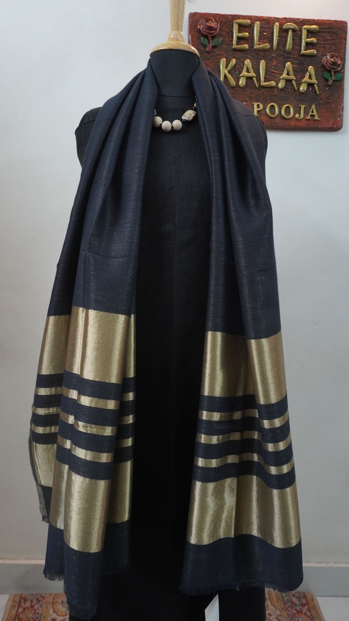 Black fine wool reversible stole with zari and striped detailing near the ends