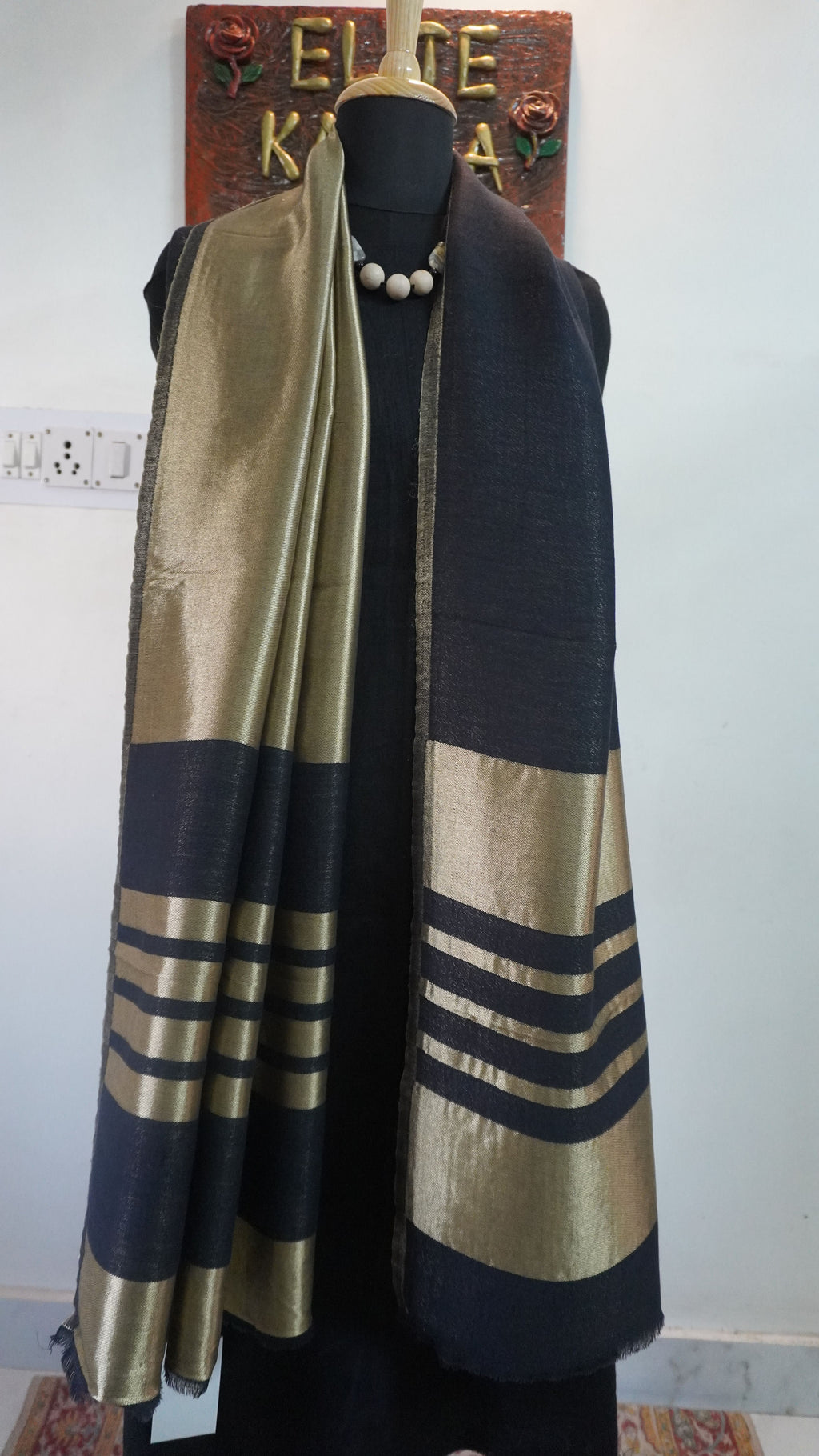Black fine wool reversible stole with zari and striped detailing near the ends