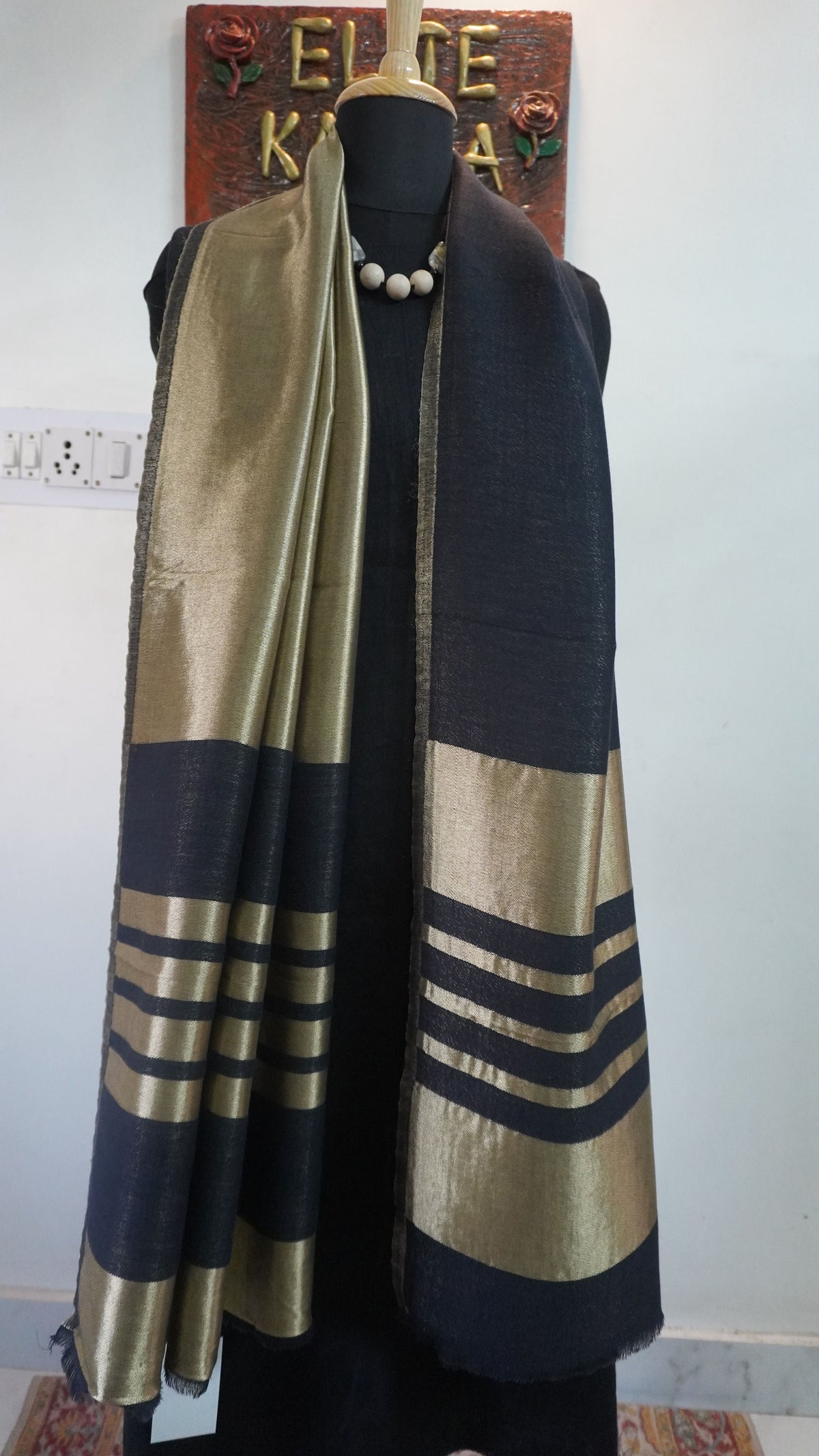 Black fine wool reversible stole with zari and striped detailing near the ends