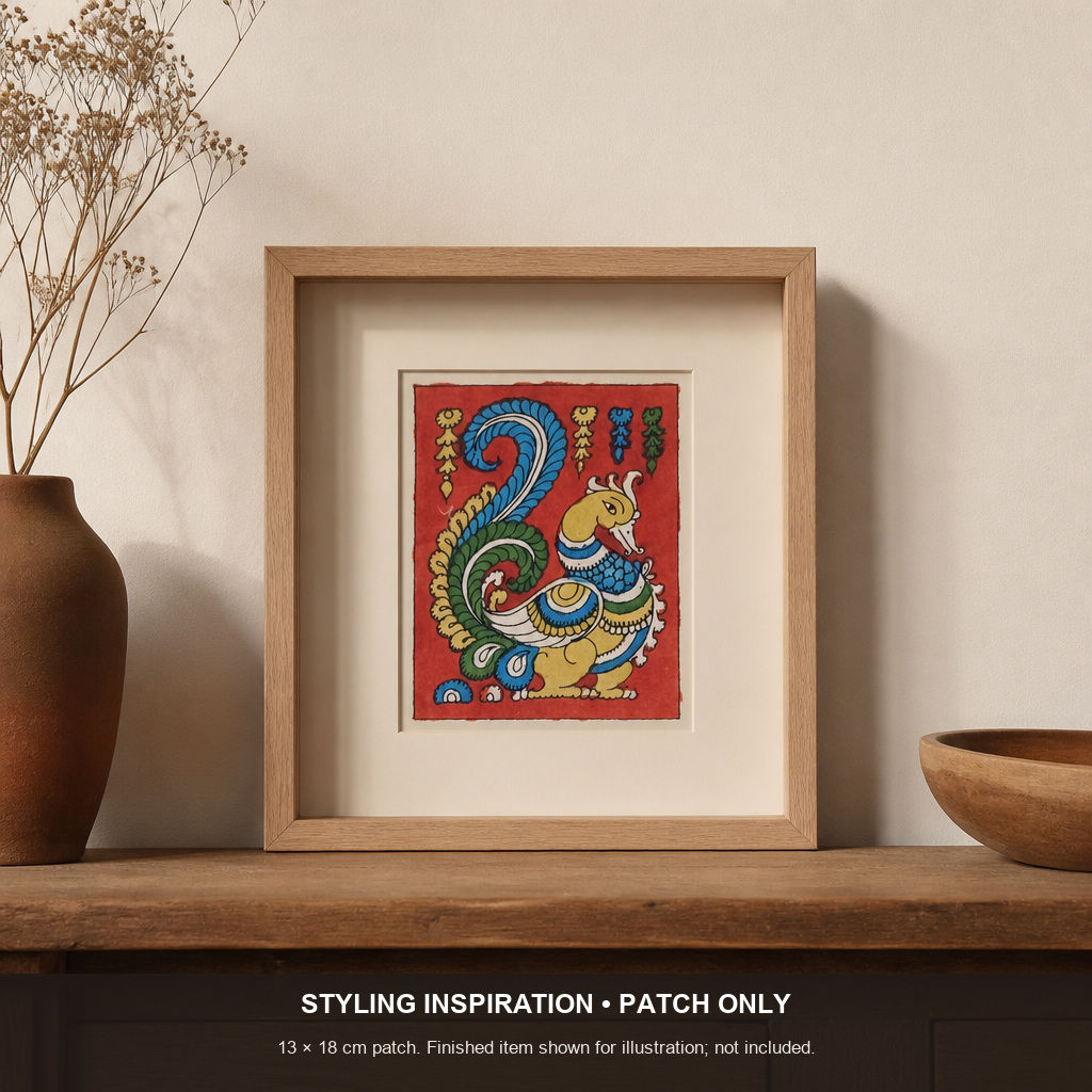 Red Kalamkari cloth patch with a figurative pattern