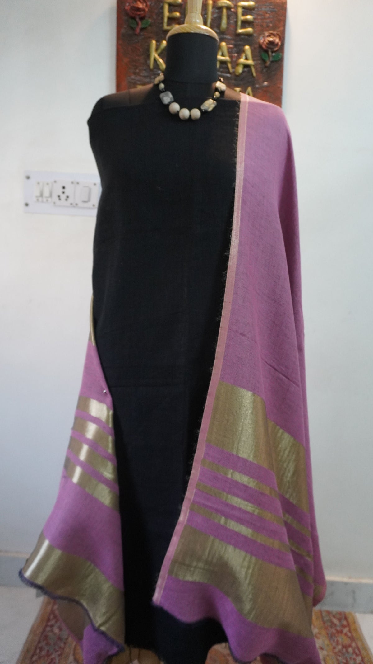 Light pink reversible fine wool stole with zari detail and a subtle border