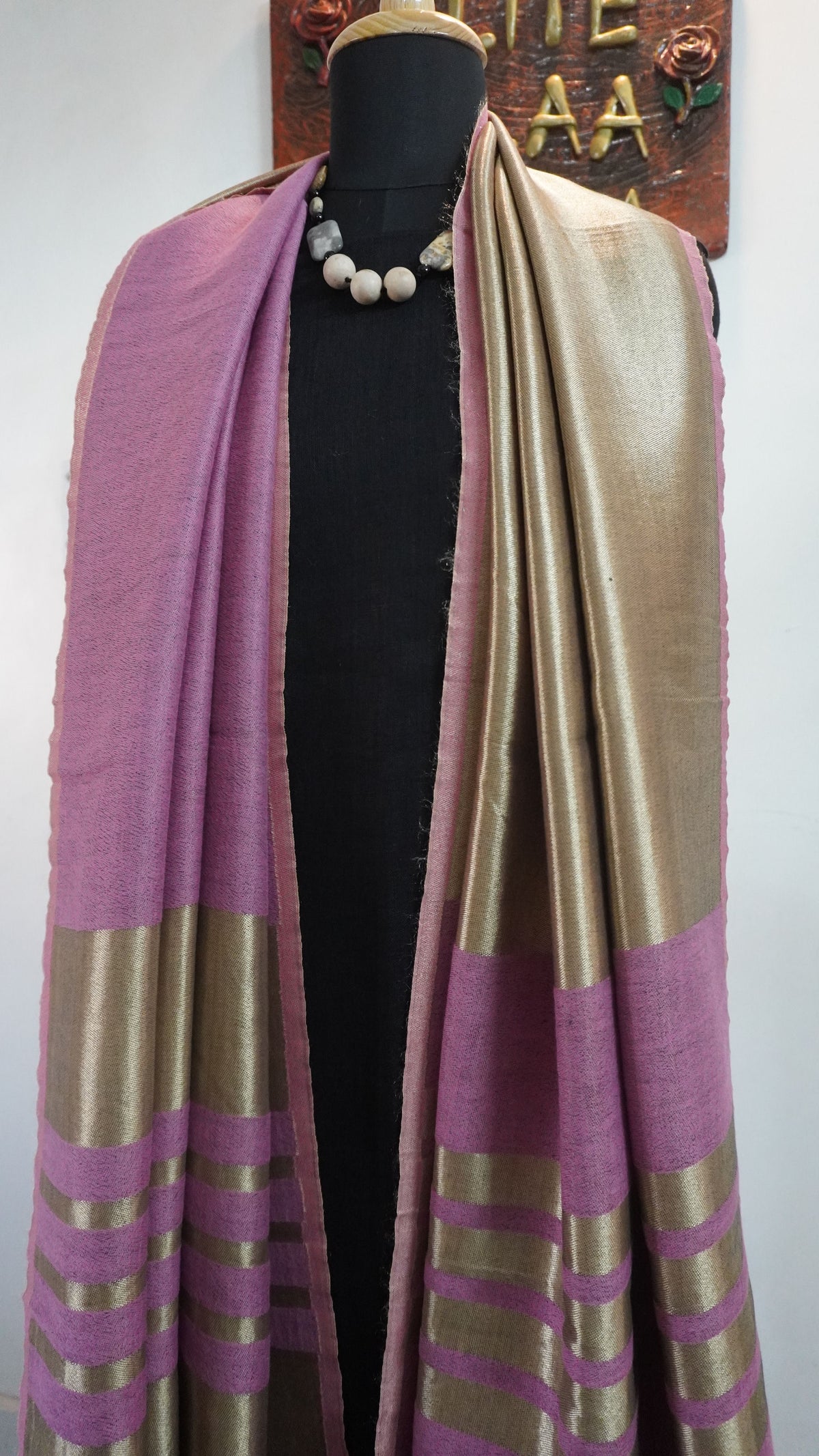 Light pink reversible fine wool stole with zari detail and a subtle border