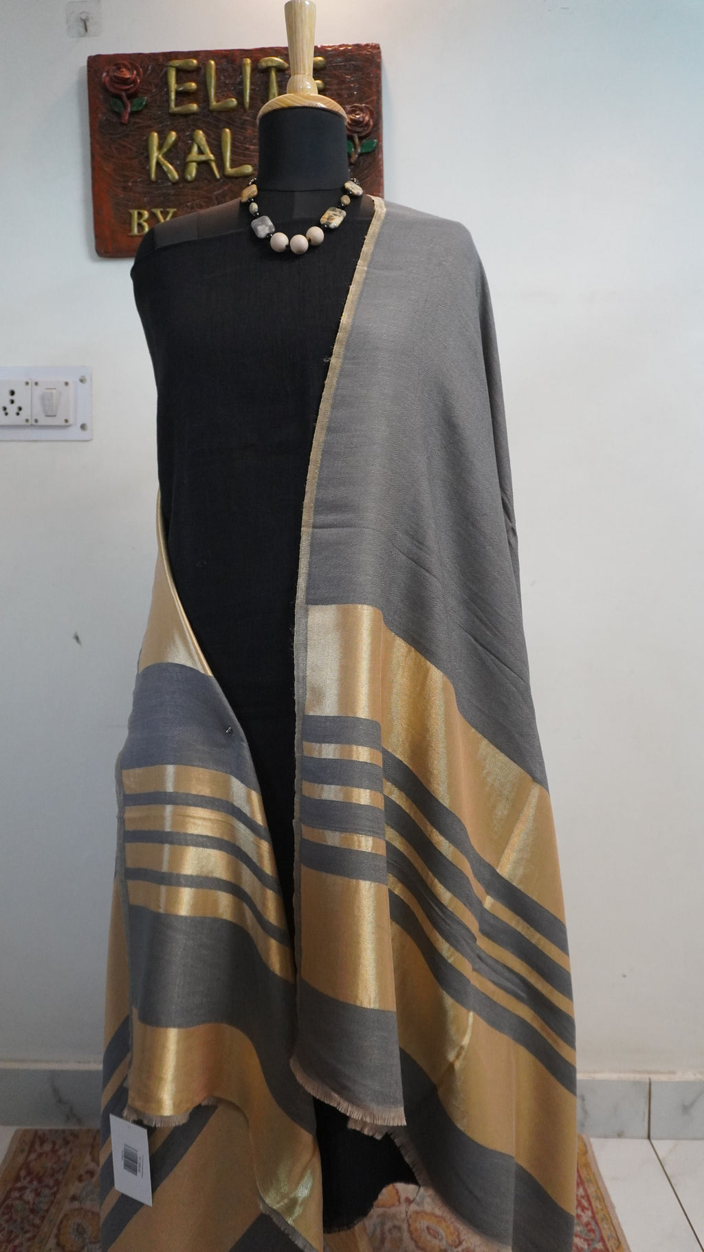 Grey fine wool reversible stole with zari detailing, striped pattern, border and fringe