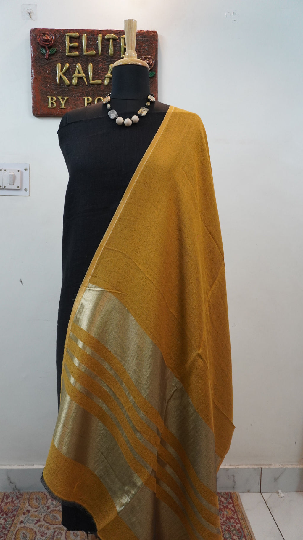 Mustard reversible fine wool stole with zari and gold striped detailing near the ends