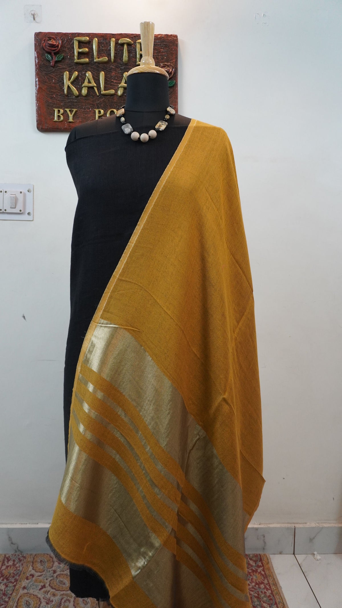 Mustard reversible fine wool stole with zari and gold striped detailing near the ends