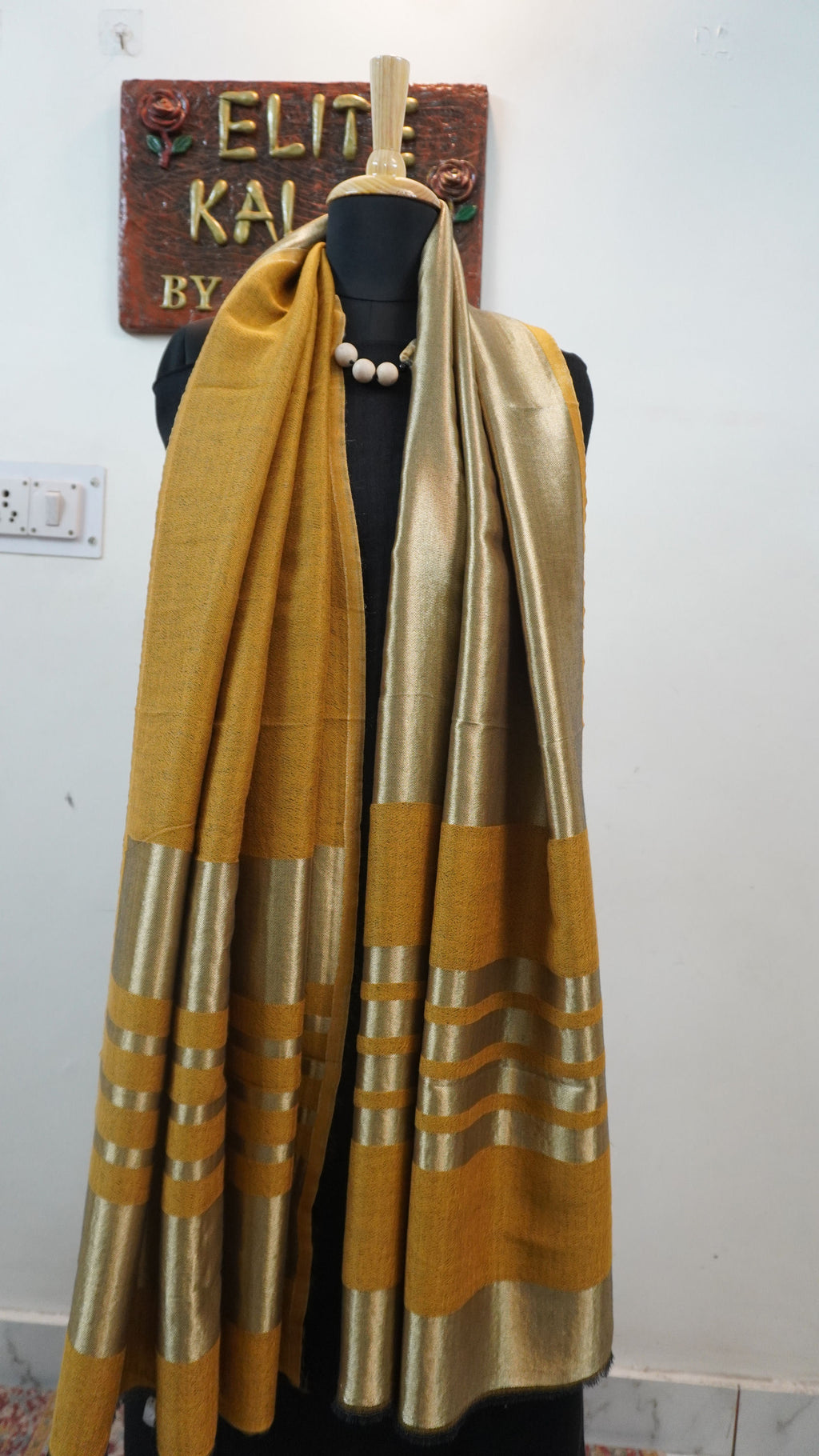 Mustard reversible fine wool stole with zari and gold striped detailing near the ends