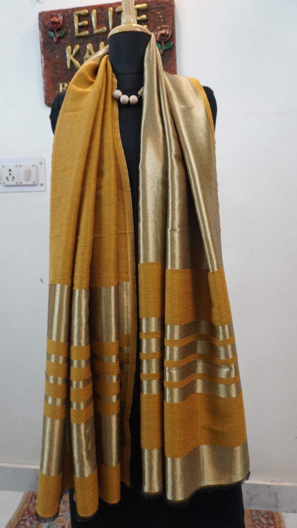 Mustard reversible fine wool stole with zari and gold striped detailing near the ends