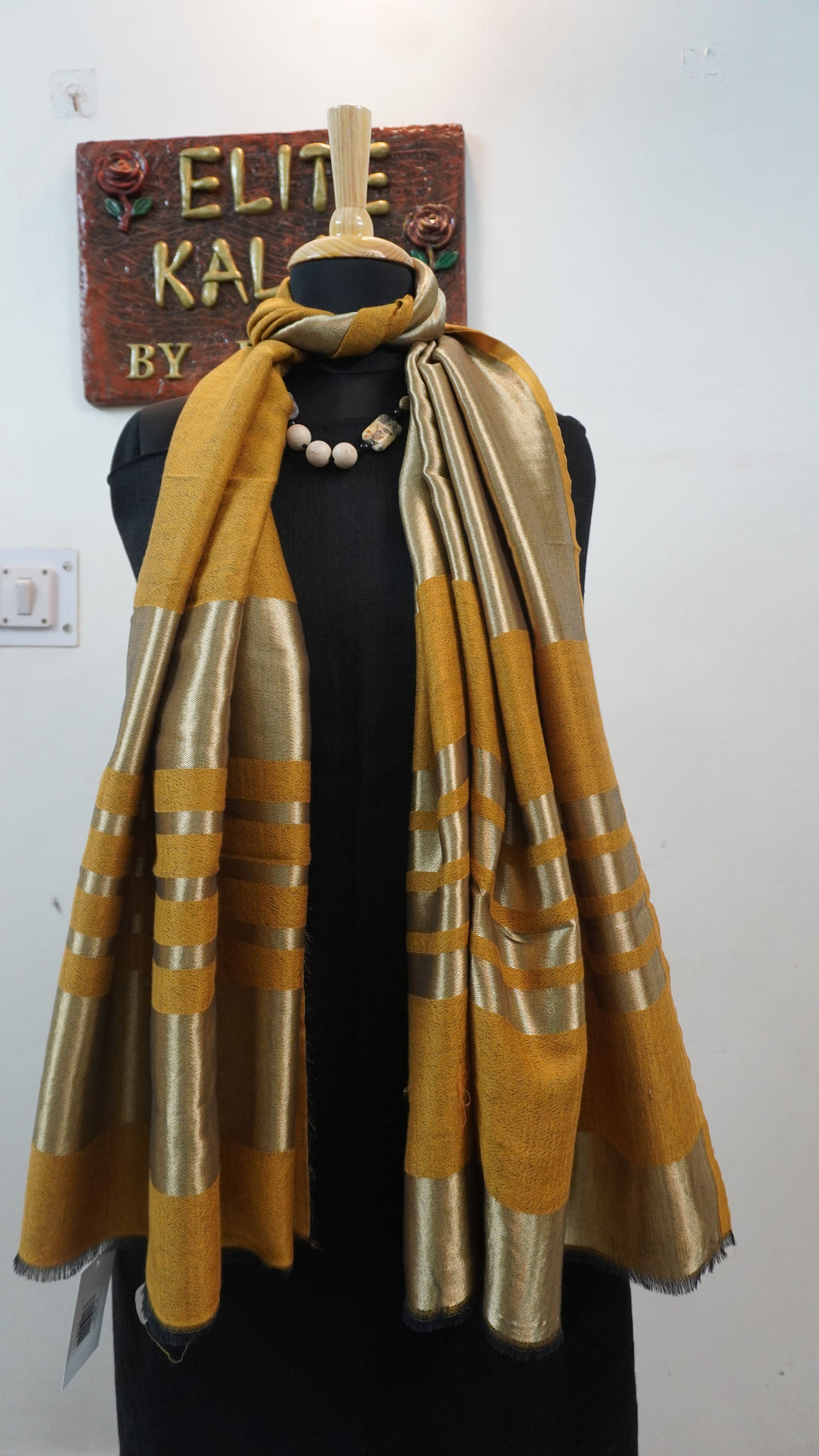Mustard reversible fine wool stole with zari and gold striped detailing near the ends