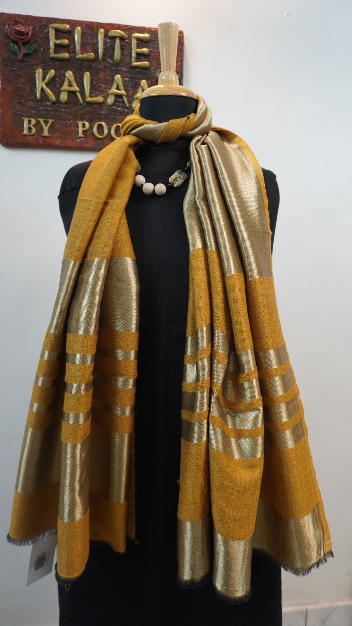 Mustard reversible fine wool stole with zari and gold striped detailing near the ends
