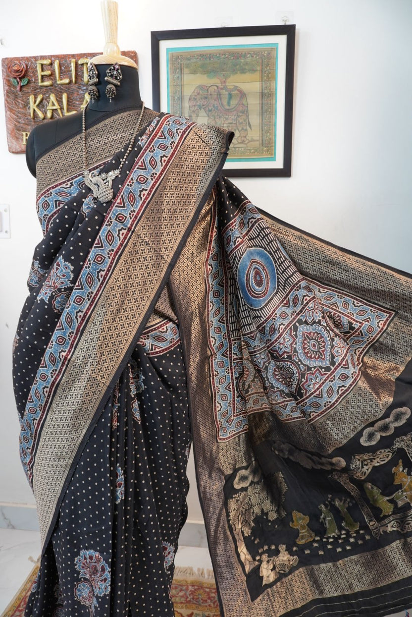 Black Dola silk Ajrakh saree with all-over big flower boota, polka dots and meenakari palla