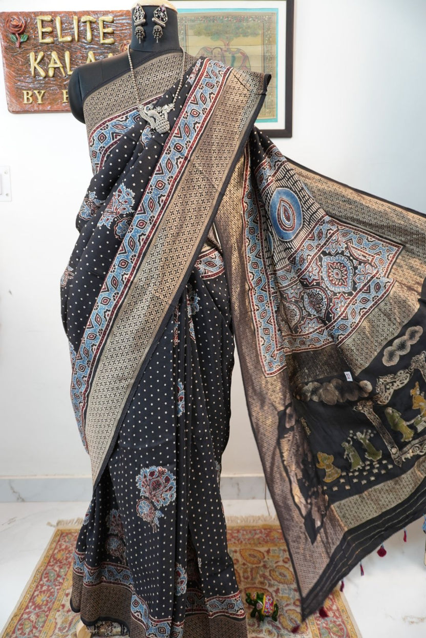 Black Dola silk Ajrakh saree with all-over big flower boota, polka dots and meenakari palla