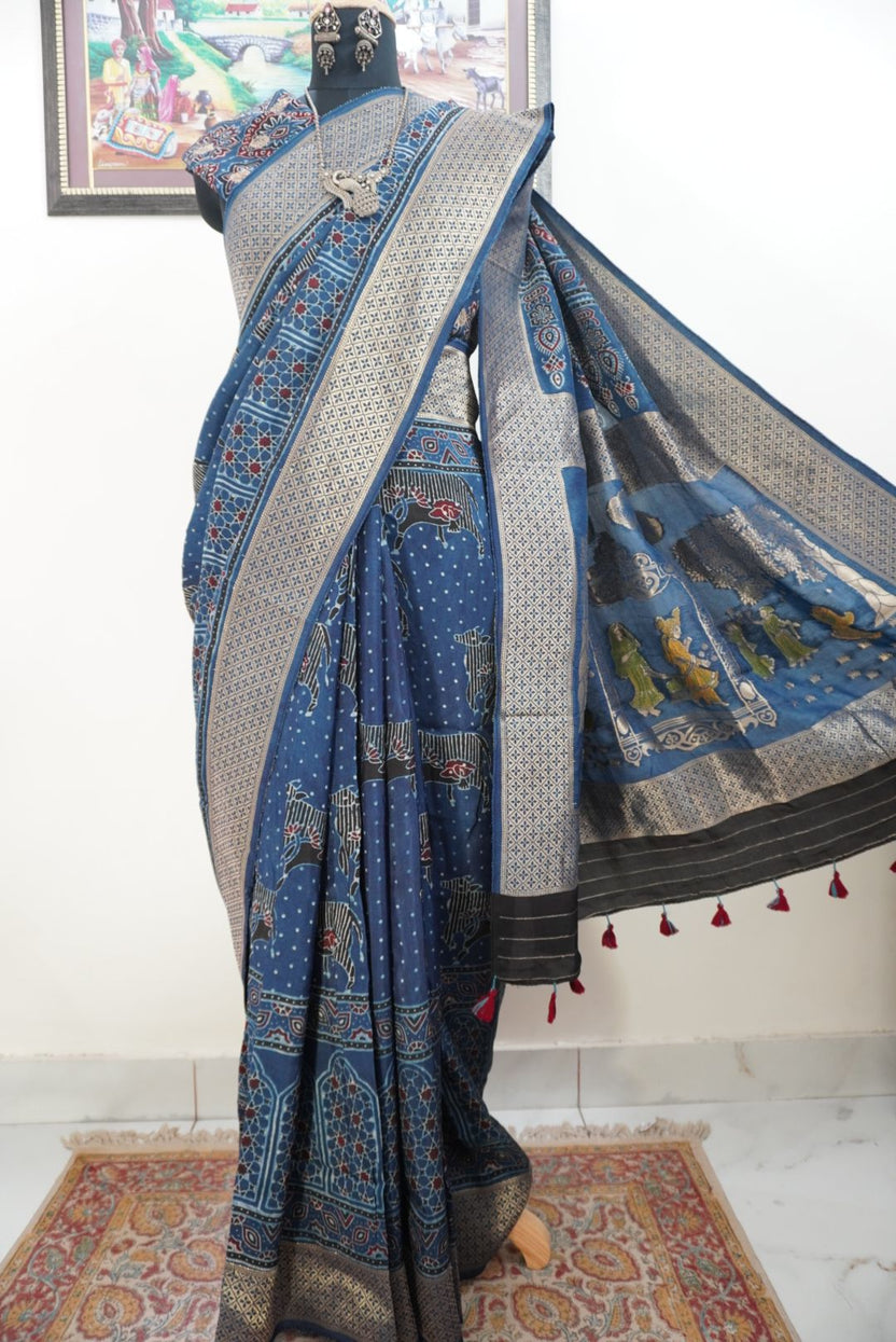Blue Ajrakh Dola silk saree with multicolor block print, border and tassels