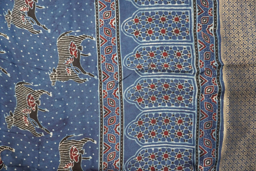 Blue Ajrakh Dola silk saree with multicolor block print, border and tassels