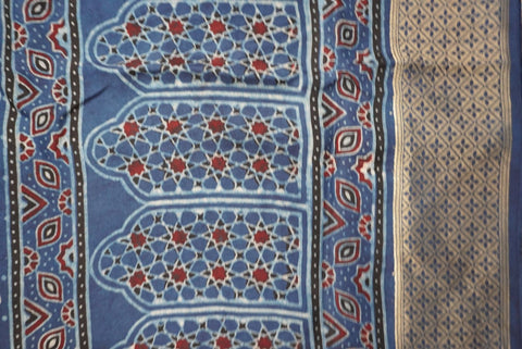 Blue Ajrakh Dola silk saree with multicolor block print, border and tassels