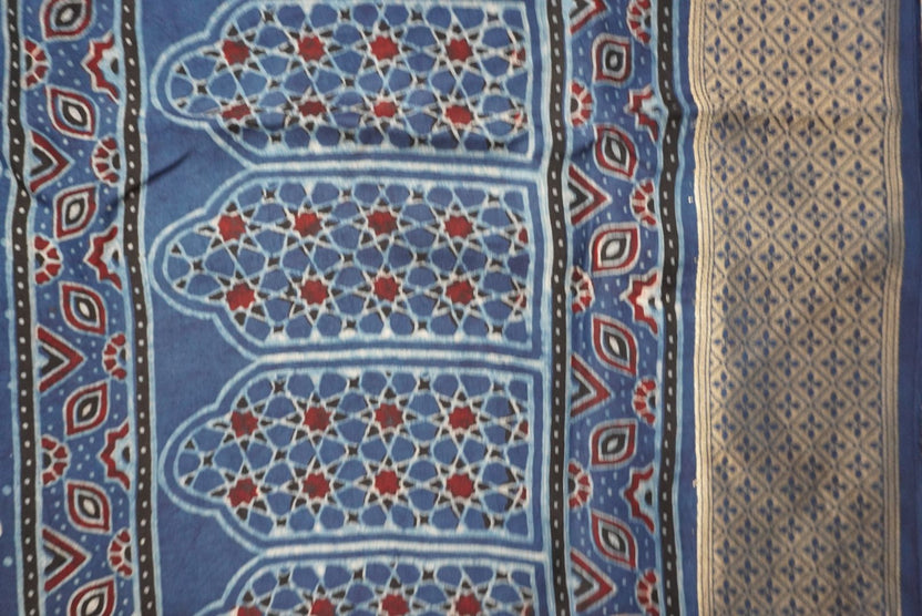 Blue Ajrakh Dola silk saree with multicolor block print, border and tassels