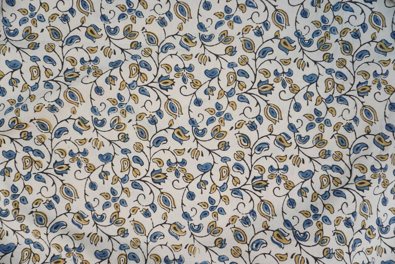 Ivory Ajrakh cotton saree with olive green and blue design, border and tassels