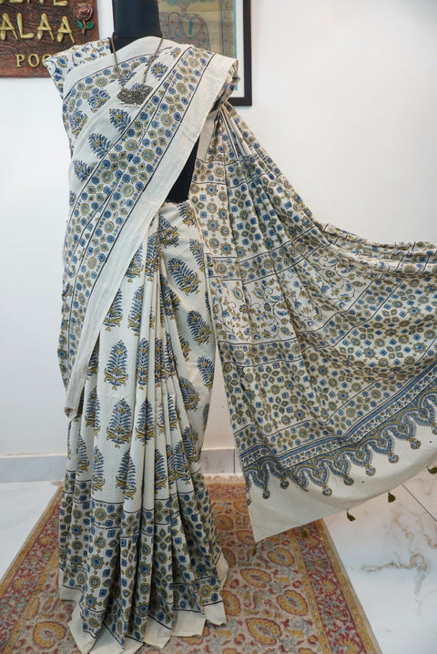 Ivory Ajrakh cotton saree with olive green and blue design, border and tassels