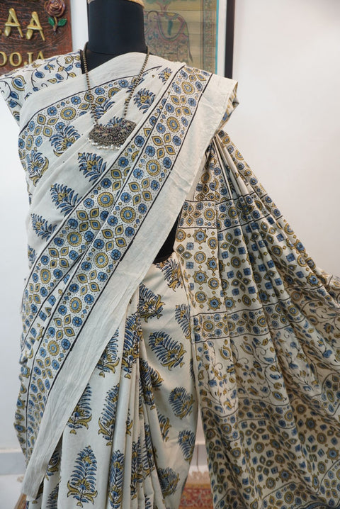 Ivory Ajrakh cotton saree with olive green and blue design, border and tassels