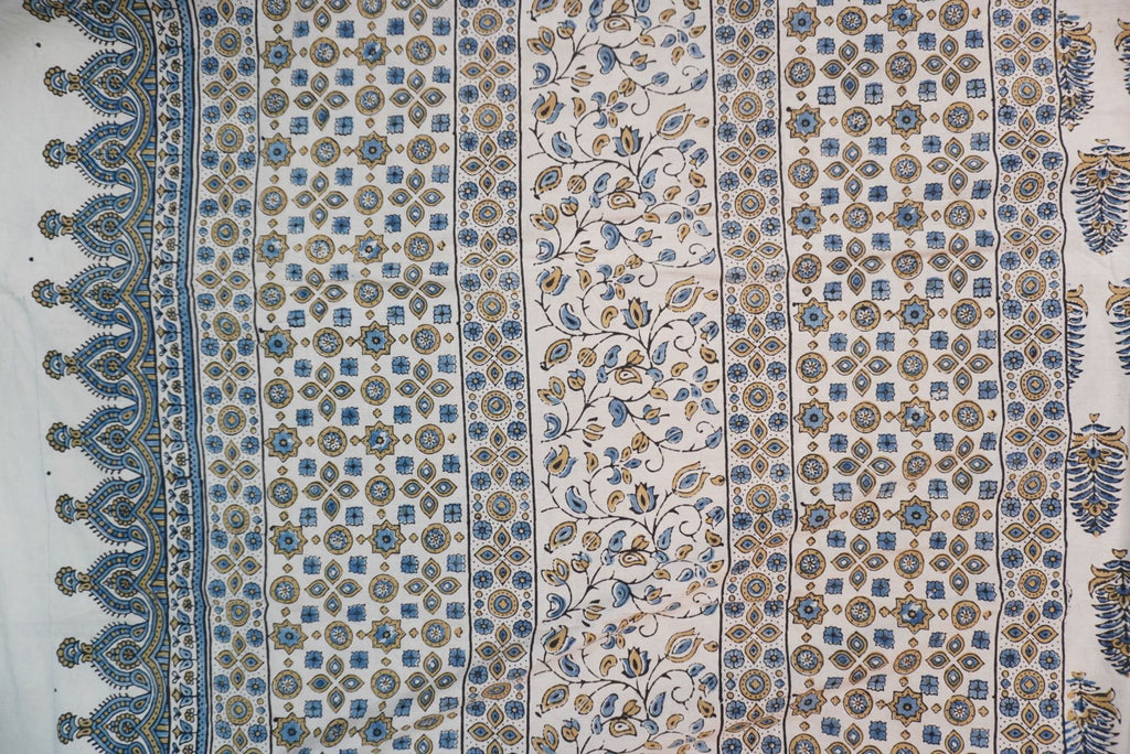 Ivory Ajrakh cotton saree with olive green and blue design, border and tassels