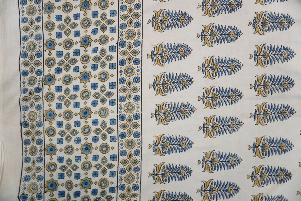 Ivory Ajrakh cotton saree with olive green and blue design, border and tassels