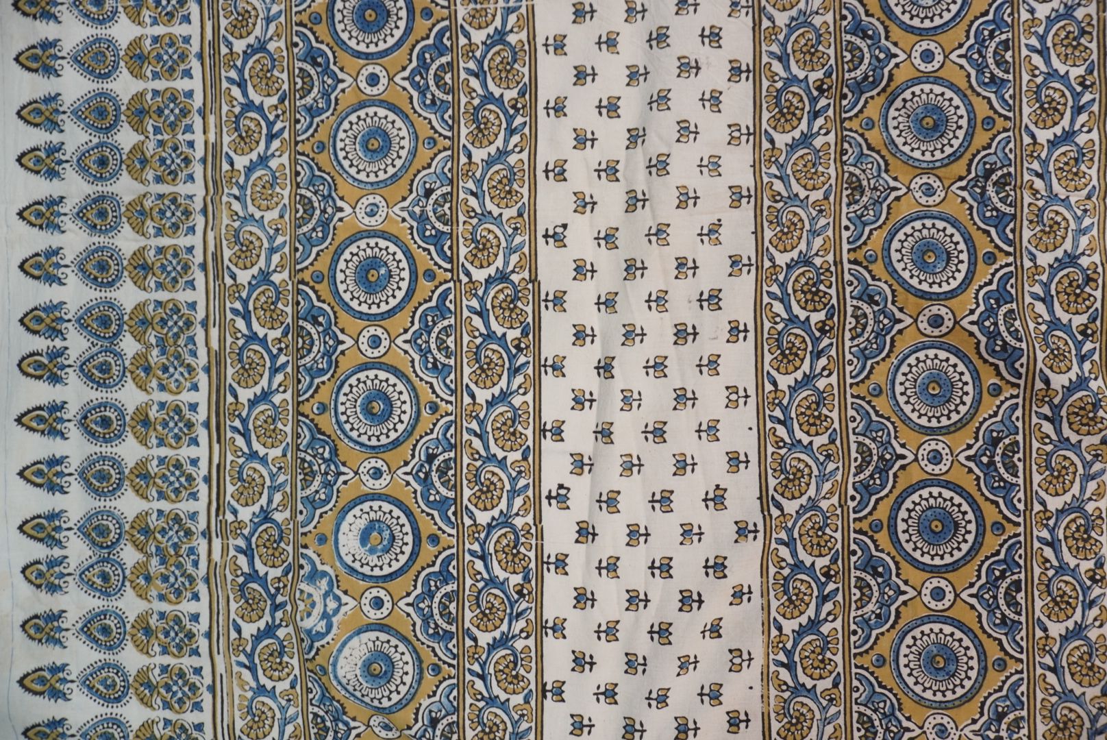 Ajrakh cotton saree in ivory with olive green and blue design and border
