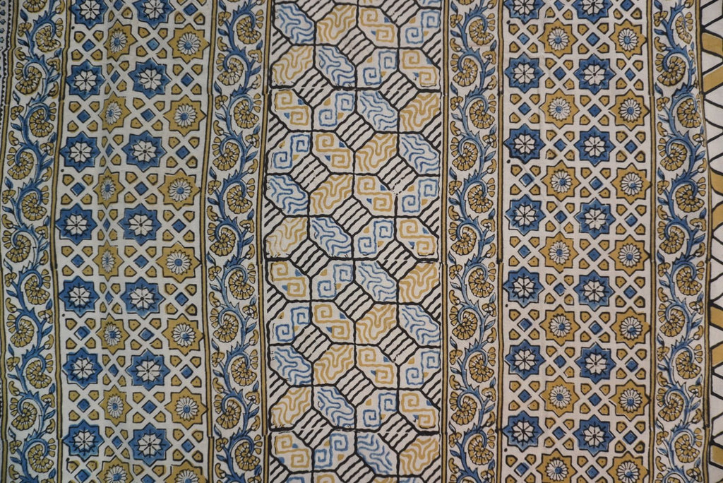 Ajrakh cotton saree in ivory with olive green, blue and yellow all-over design and border detail
