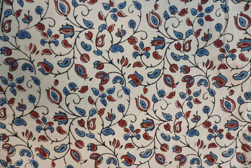 Cotton Ajrakh saree in ivory with red rust and blue, all-over pattern, border and tassels