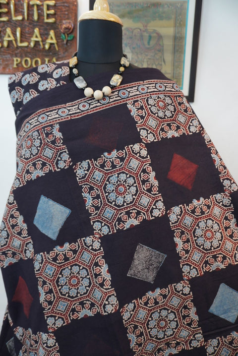 Black Ajrakh cotton saree with all-over multicolor pattern and border detail