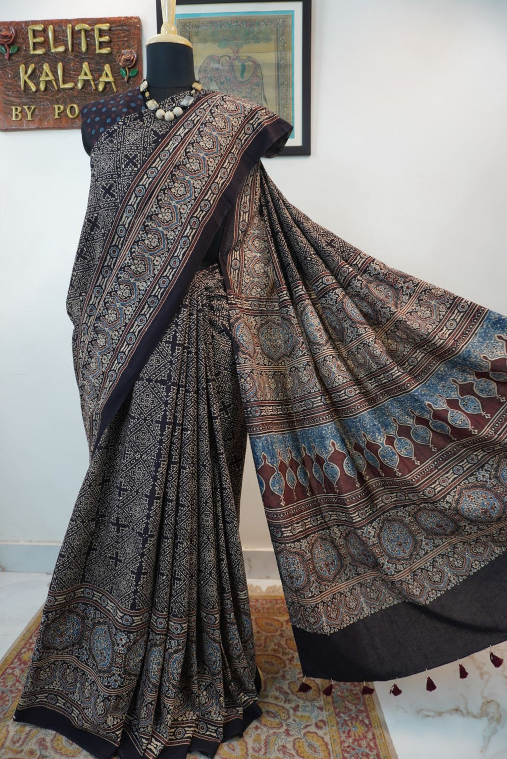 Black Ajrakh cotton saree with all-over pattern, blue beige and maroon details, and border