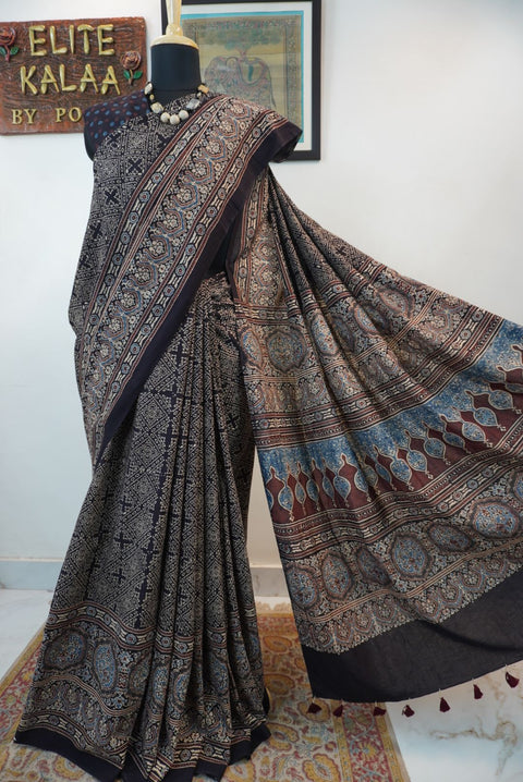 Black Ajrakh cotton saree with all-over pattern, blue beige and maroon details, and border