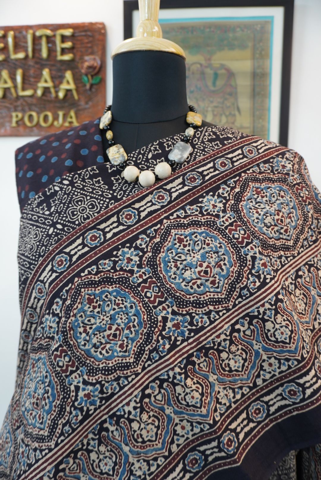 Black Ajrakh cotton saree with all-over pattern, blue beige and maroon details, and border