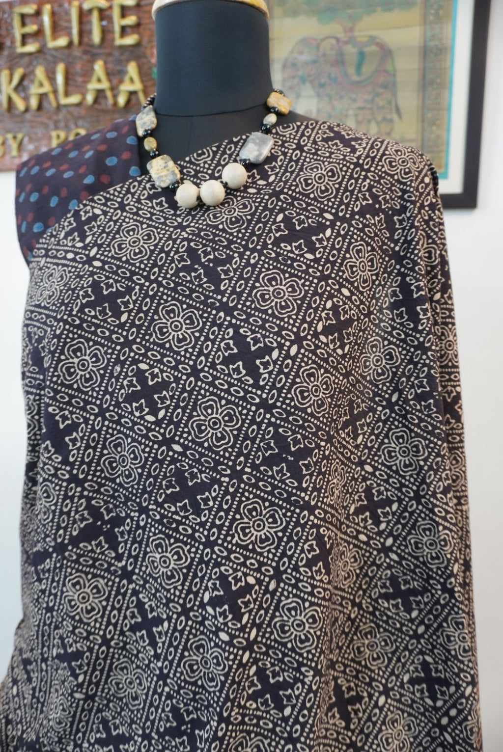 Black Ajrakh cotton saree with all-over pattern, blue beige and maroon details, and border