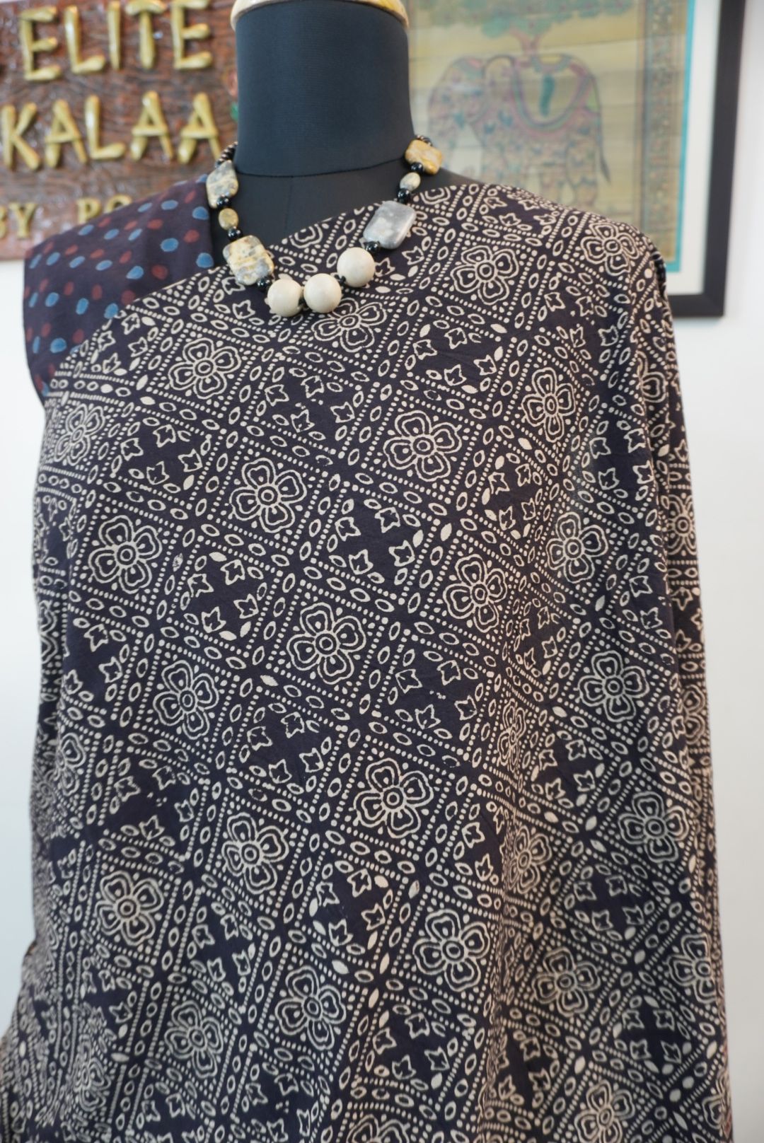 Black Ajrakh cotton saree with all-over pattern, blue beige and maroon details, and border