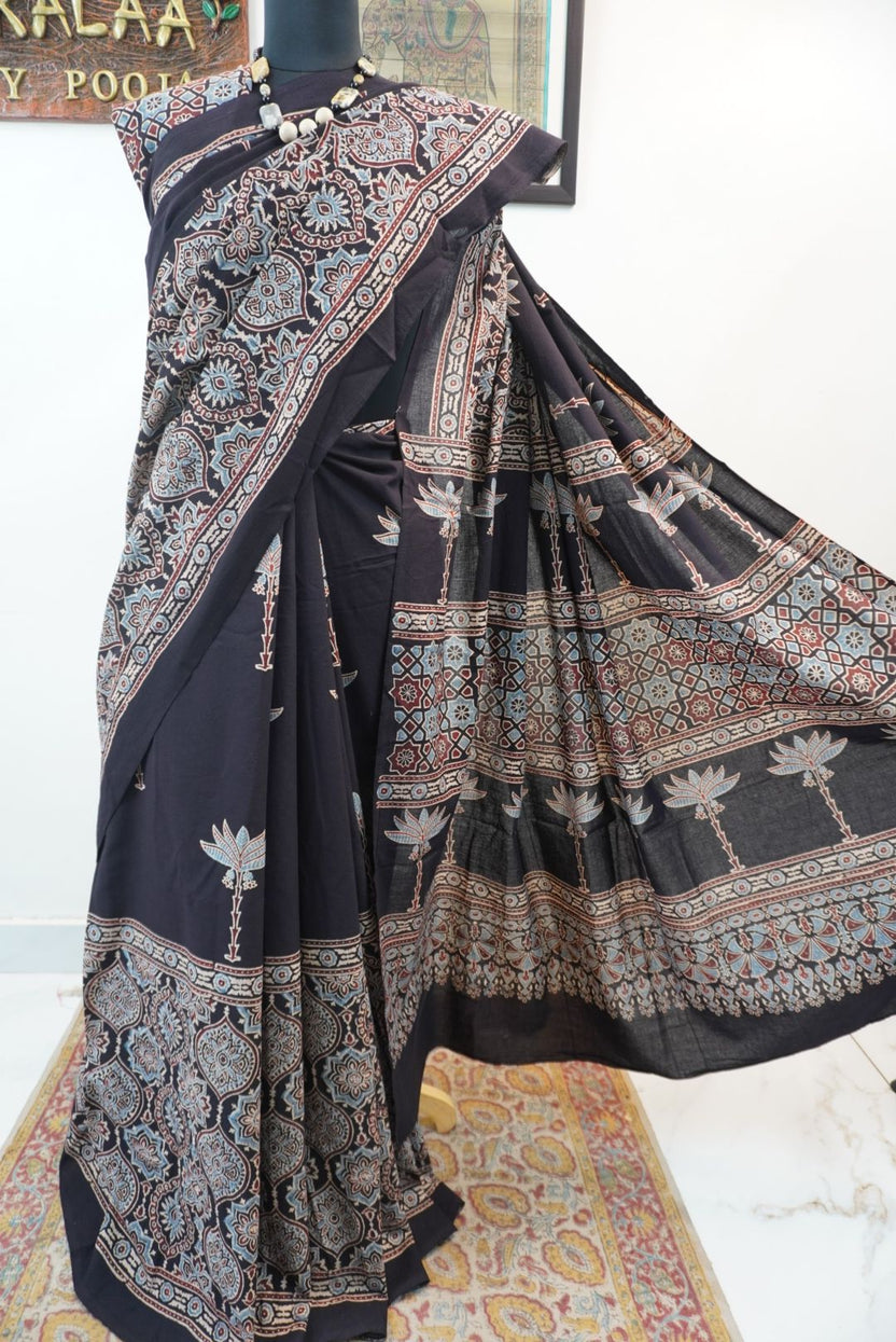 Black Ajrakh cotton saree with blue, red and cream border detail