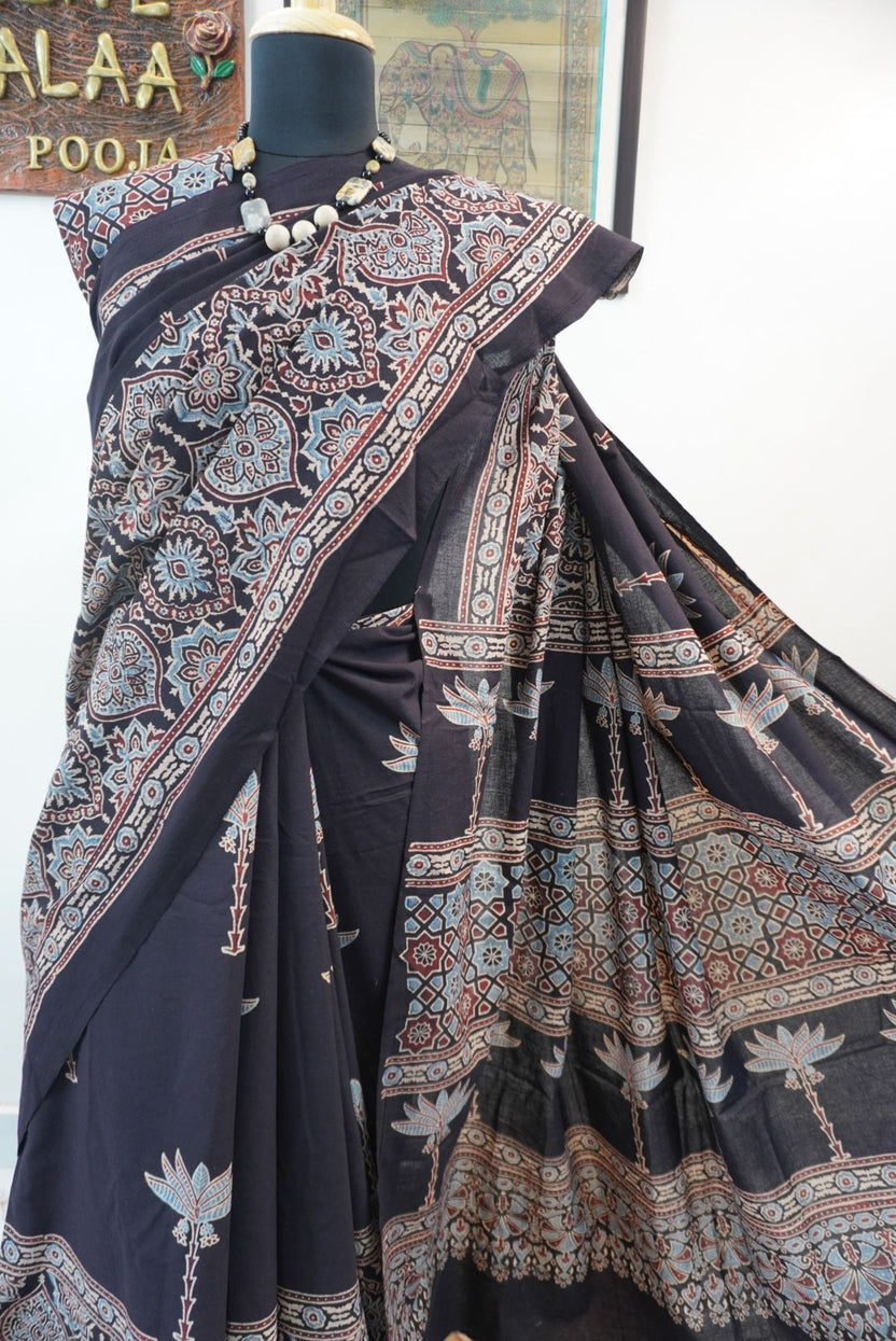 Black Ajrakh cotton saree with blue, red and cream border detail