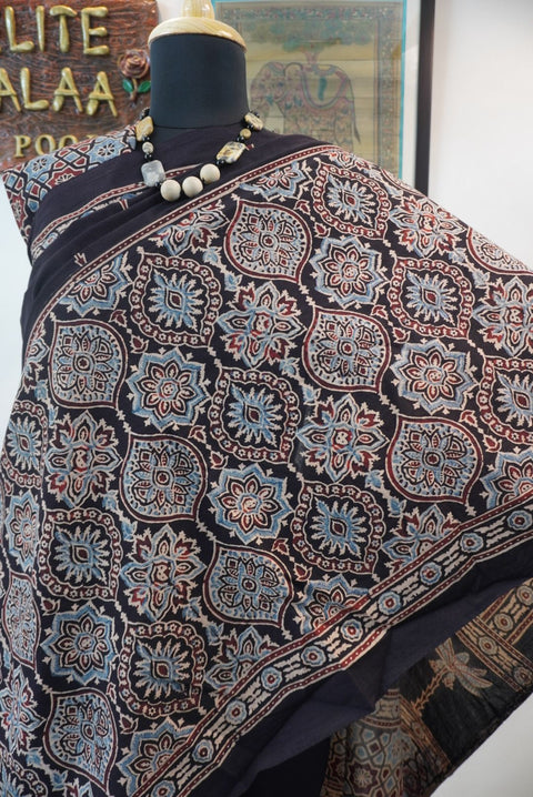 Black Ajrakh cotton saree with blue, red and cream border detail