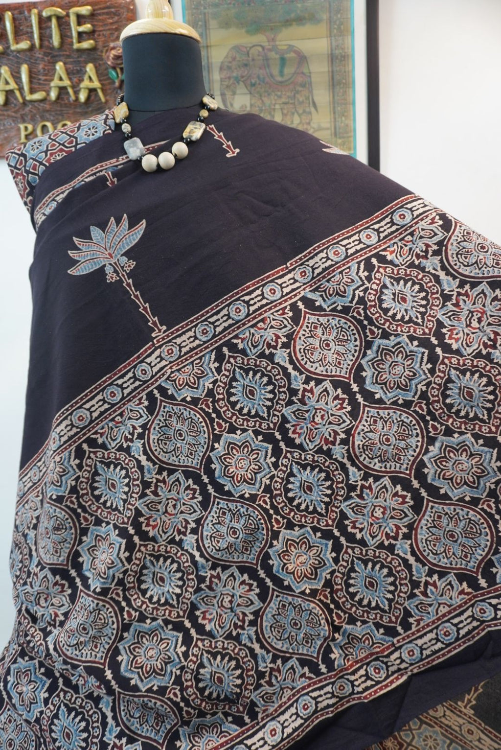 Black Ajrakh cotton saree with blue, red and cream border detail