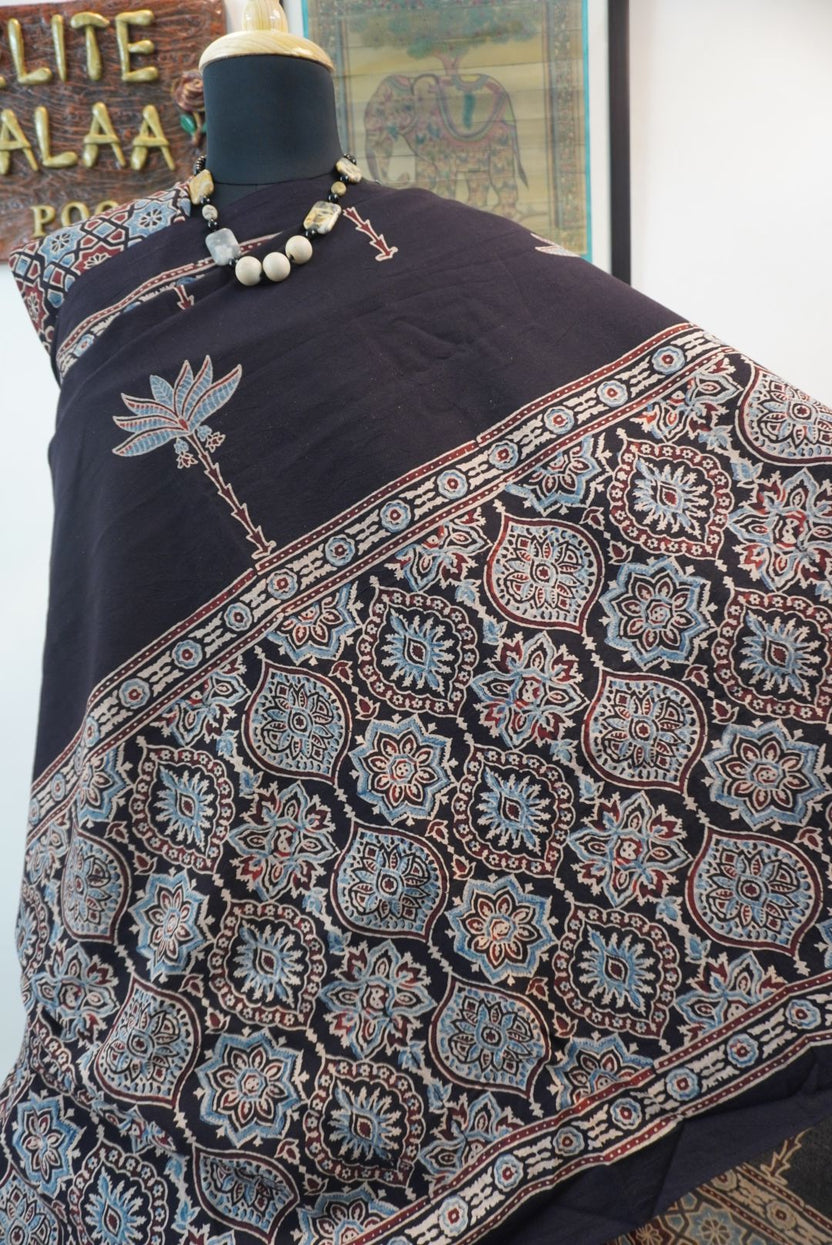 Black Ajrakh cotton saree with blue, red and cream border detail