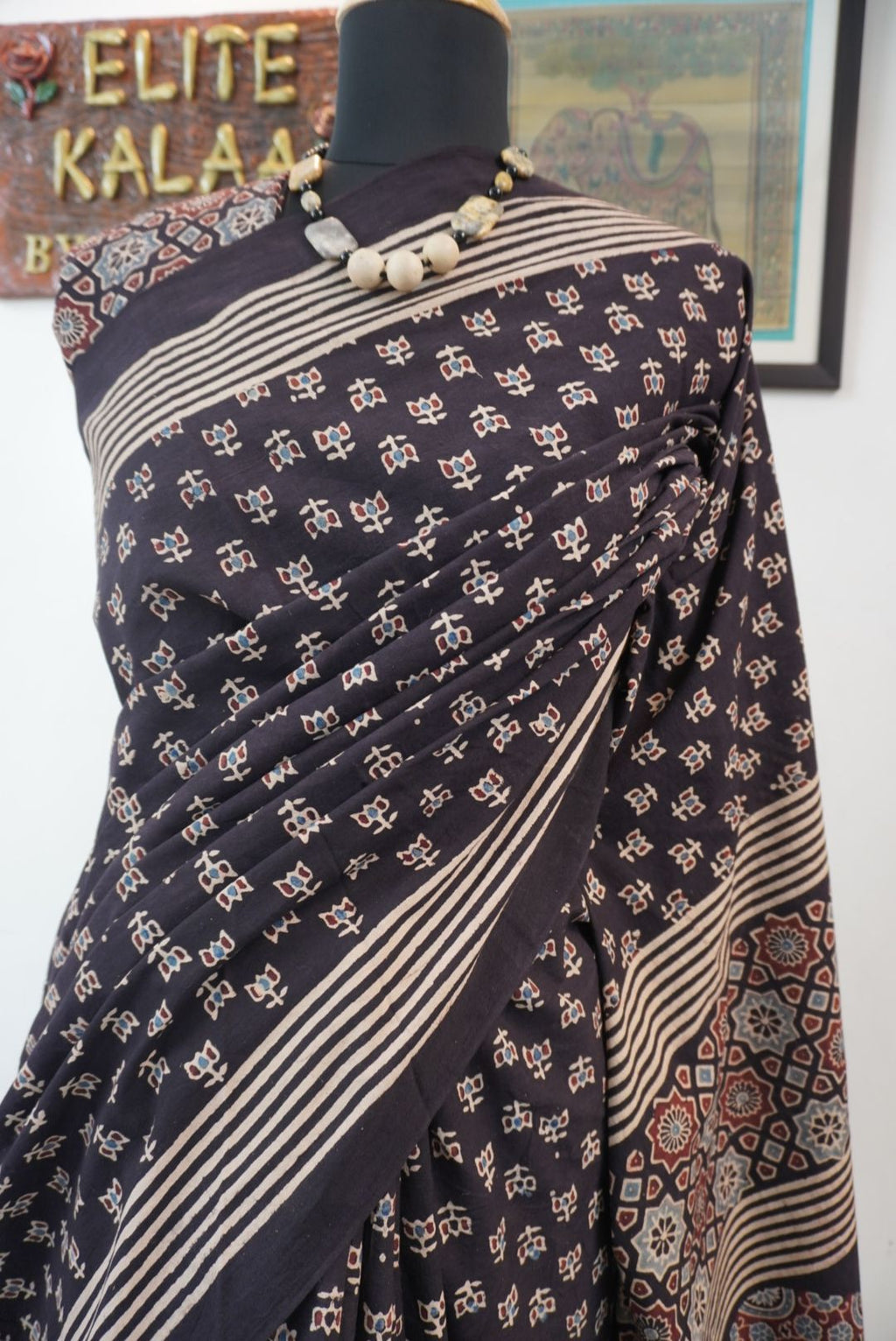 Black Ajrakh cotton saree with multicolor block print, border and tassels