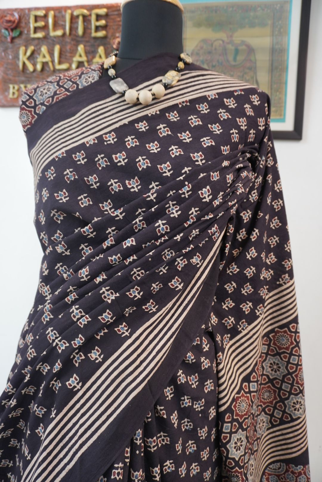 Black Ajrakh cotton saree with multicolor block print, border and tassels