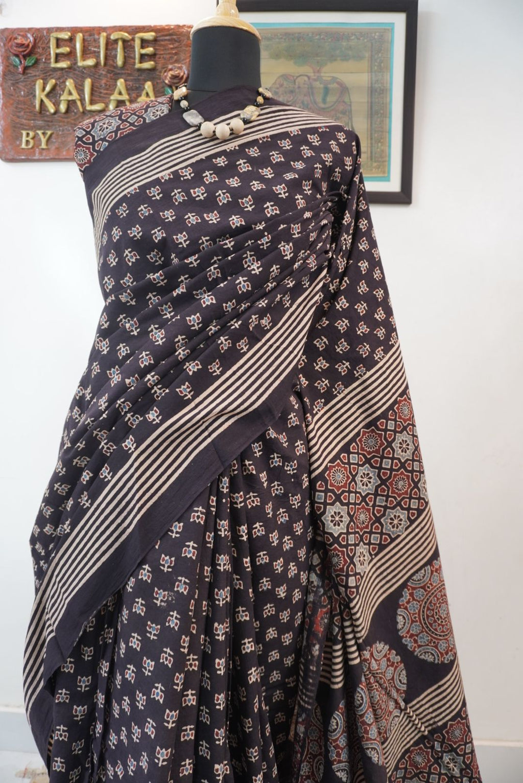 Black Ajrakh cotton saree with multicolor block print, border and tassels