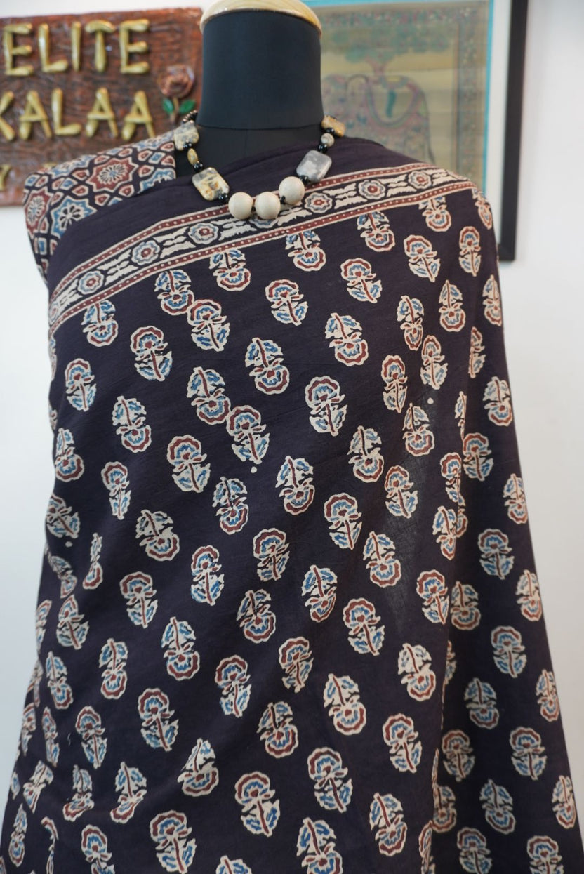 Black Ajrakh cotton saree with small flower and chevron design, border and tassels