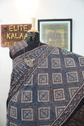 Brown Ajrakh cotton saree with blue and cream geometric stripes and a border