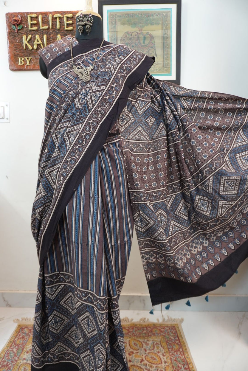 Brown Ajrakh cotton saree with blue and cream geometric stripes and a border