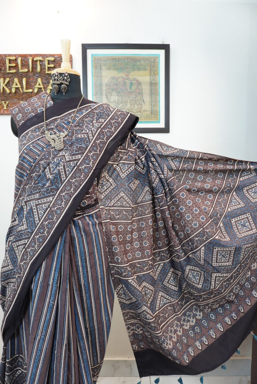 Brown Ajrakh cotton saree with blue and cream geometric stripes and a border