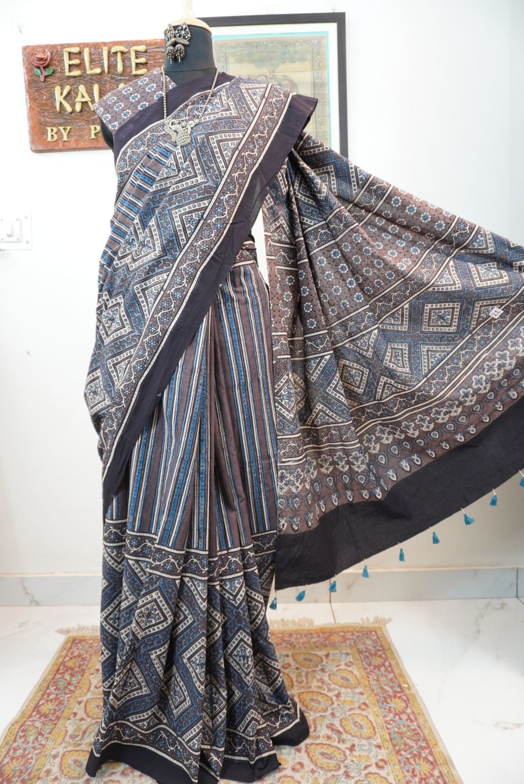 Brown Ajrakh cotton saree with blue and cream geometric stripes and a border