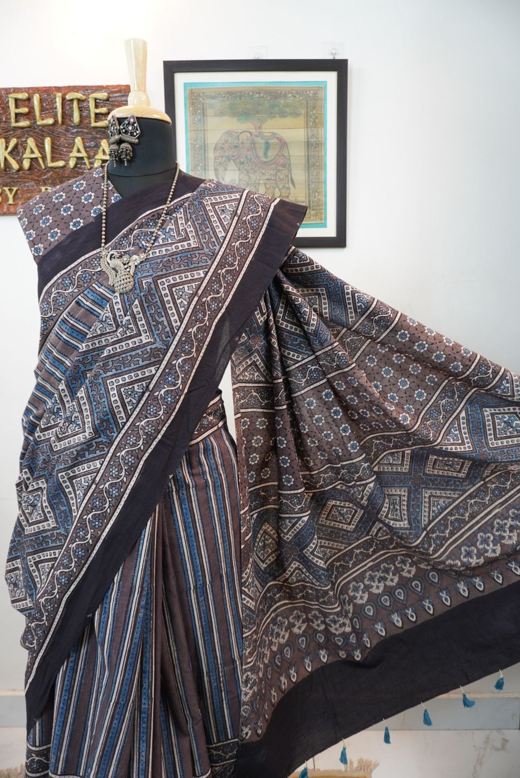 Brown Ajrakh cotton saree with blue and cream geometric stripes and a border