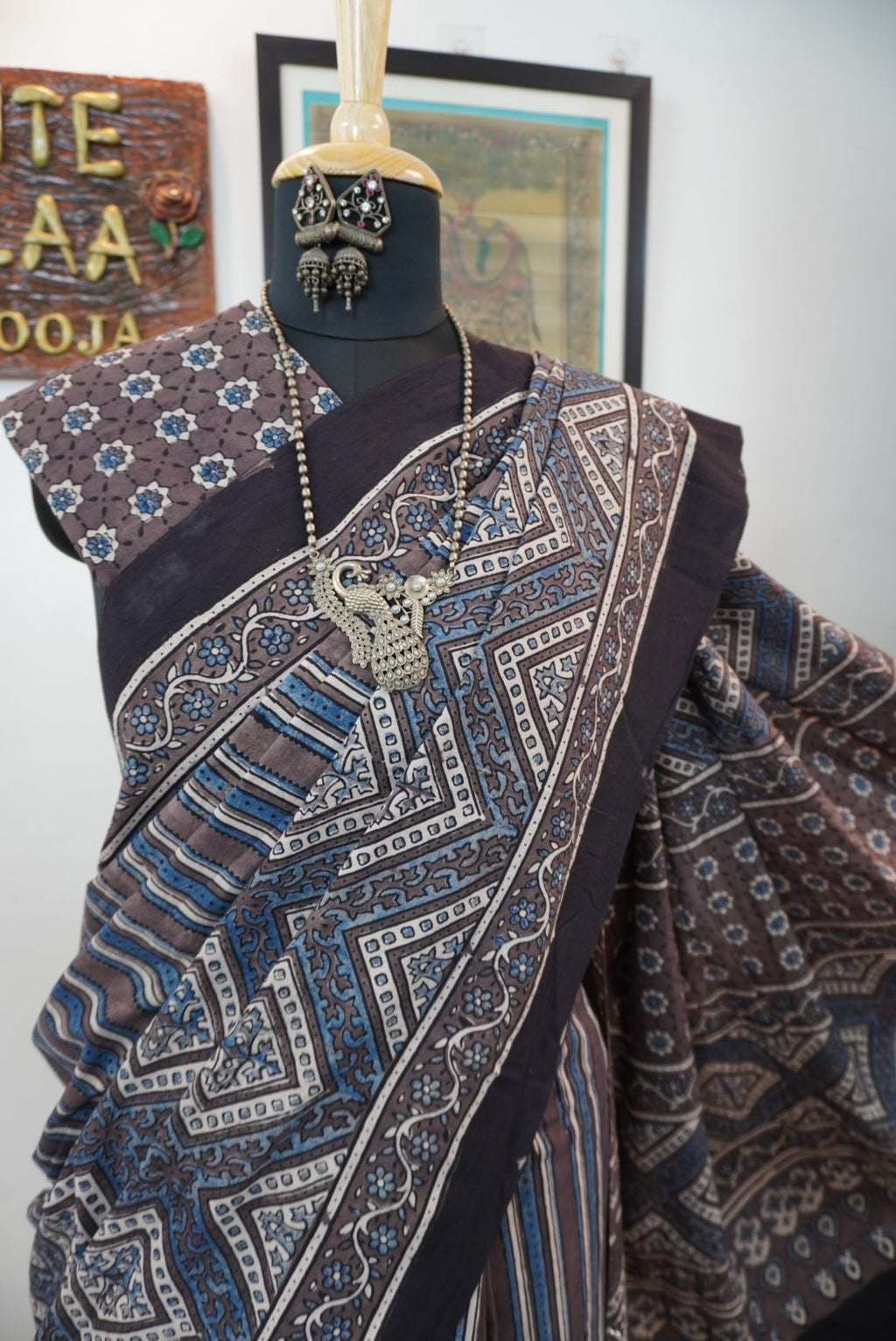 Brown Ajrakh cotton saree with blue and cream geometric stripes and a border