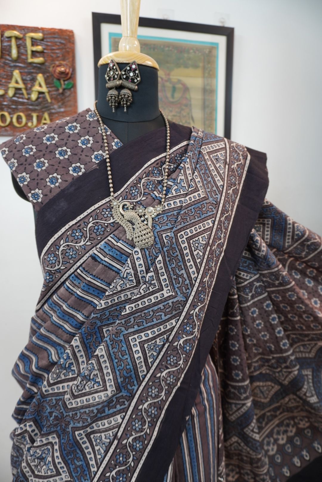 Brown Ajrakh cotton saree with blue and cream geometric stripes and a border